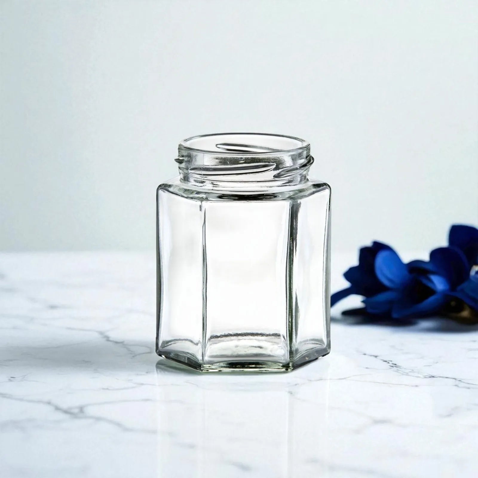 Case of 12 hexagon glass jars 190ml with black lids for honey, jam, spices, and herbs